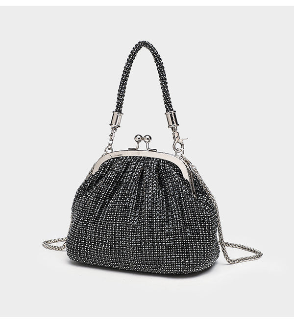 Kompakte Abendtasche mit durchgehendem Strassbesatz, silberfarbenem Metallrahmen, Strass-Tragegriff und abnehmbarer Kette