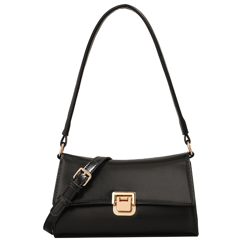 Compact structured flap shoulder bag with gold-tone turn-lock closure and adjustable strap, detail view 5