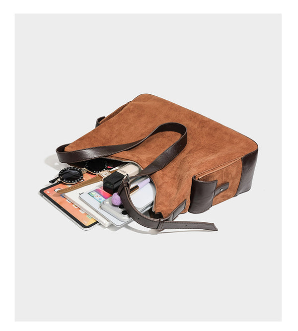 Slouchy cognac brown matte suede-look hobo shoulder bag with dark brown leather-look trim, top zip closure, front flap