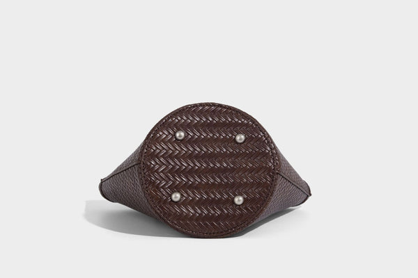 Chevron-woven bucket tote bag with braided shoulder straps and matching drawstring pouch, detail view 30