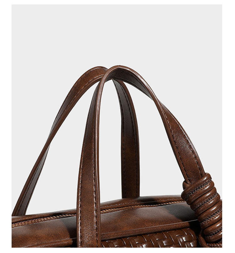 Strukturierte rechteckige Satchel-Tasche mit gewebtem Vorderteil in Lederoptik, goldfarbenen Details, zwei Tragegriffen und abnehmbarem