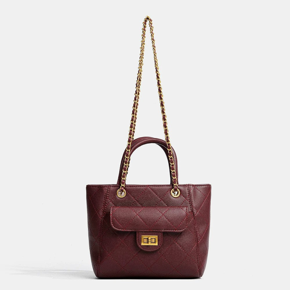 Diamond-quilted leather-look shoulder tote bag with gold-tone chain strap and dual top handles, front view