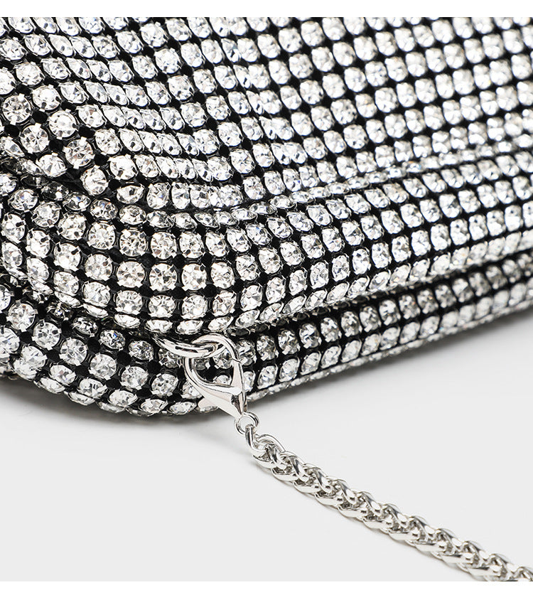 Small crystal rhinestone clutch crossbody bag with silver-tone chain strap and frame-clip closure, detail view 26