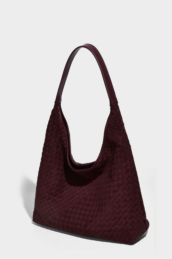 Large slouchy woven hobo tote bag with curved shoulder strap and triangular silhouette, detail view 31