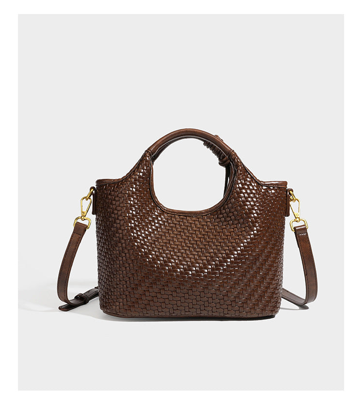 Woven leather-look tote bag in mocha brown with knotted top handle, front flap pocket, and detachable crossbody strap with