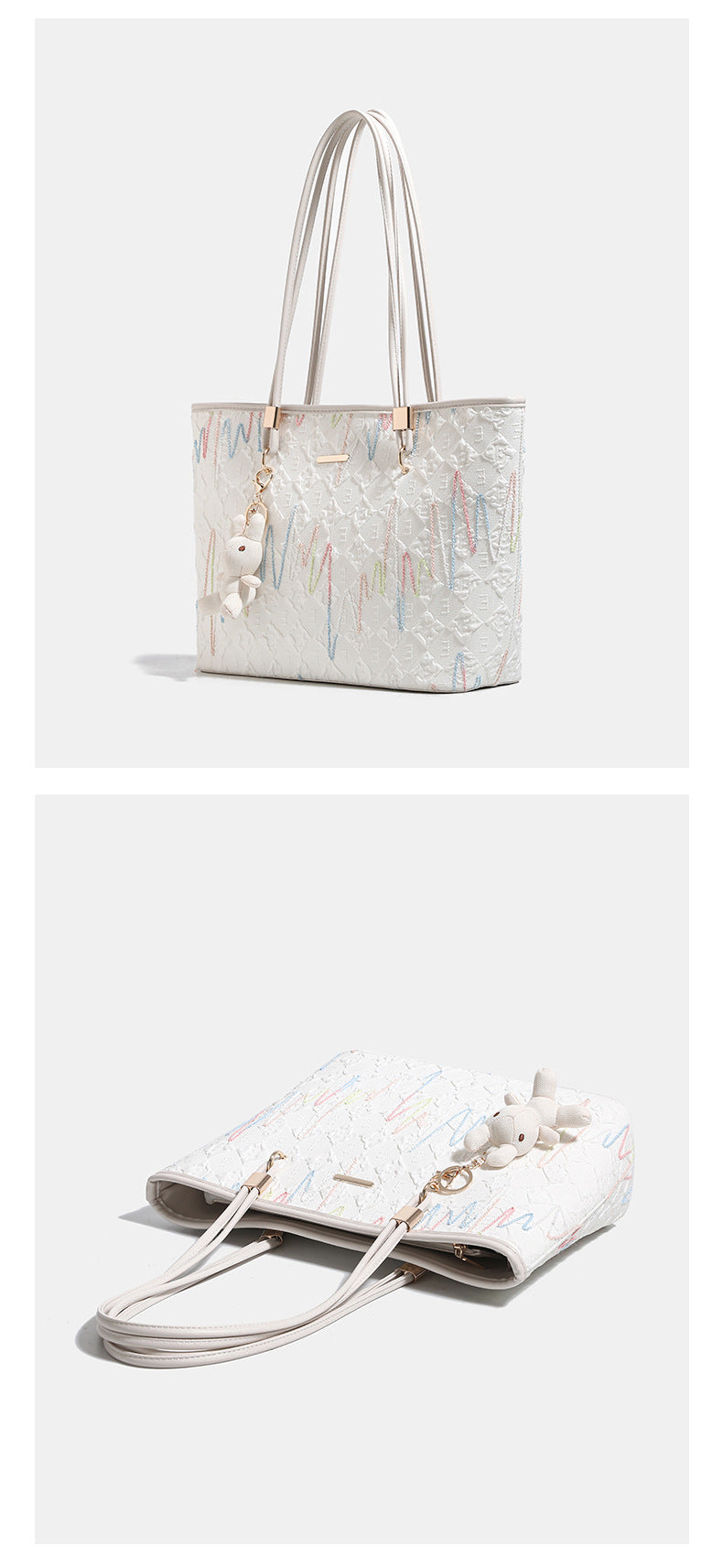 Off-white structured tote bag with dual shoulder straps, gold-tone hardware, and plush bear charm, detail view 11