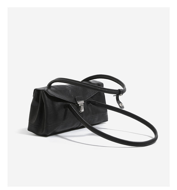 Compact structured rectangular flap shoulder bag with silver-tone turn-lock clasp and long rounded handles, detail view 10