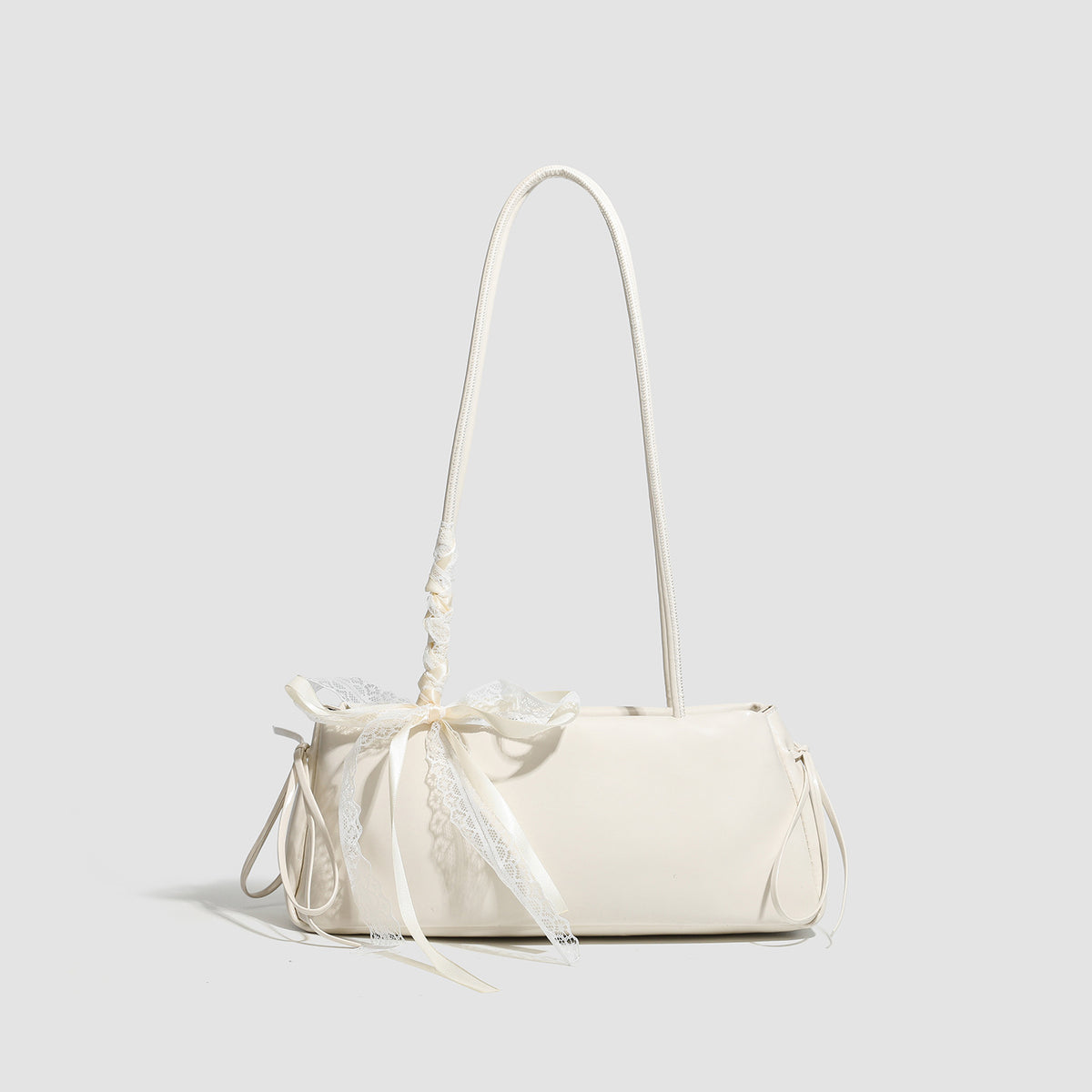 Compact glossy leather-look shoulder bag with lace bow and ribbon trim, detail view 10