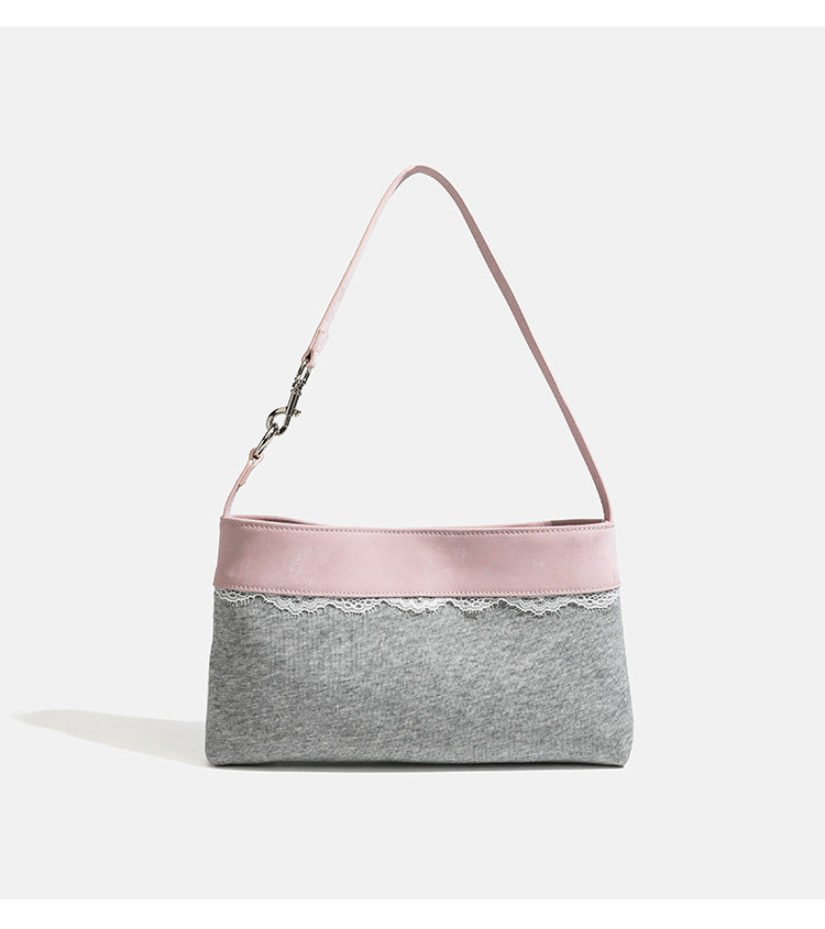 Compact gray textile shoulder bag with lace trim and smooth leather-look strap, detail view 9