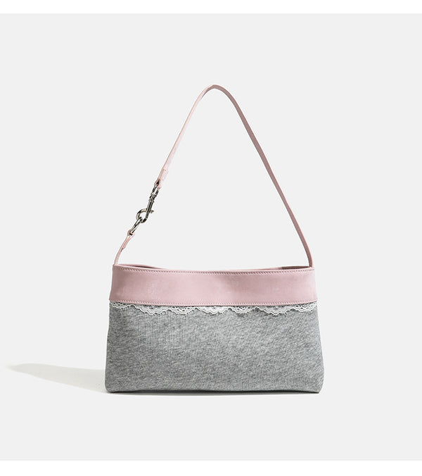 Compact gray textile shoulder bag with lace trim and smooth leather-look strap, detail view 9