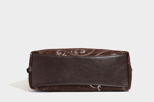 Deep chocolate suede-look hobo shoulder bag with tonal paisley floral embroidery, smooth dark leather-look trim, top zip