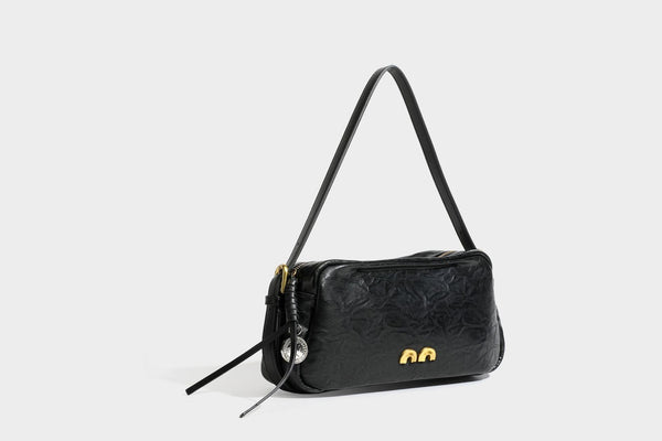 Compact black crinkled leather-look baguette shoulder bag with gold-tone arch hardware and adjustable strap, detail view 26