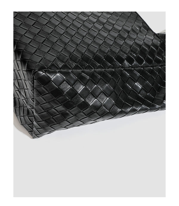 Large structured black woven diamond-pattern tote bag with braided double shoulder straps and glossy leather-look finish