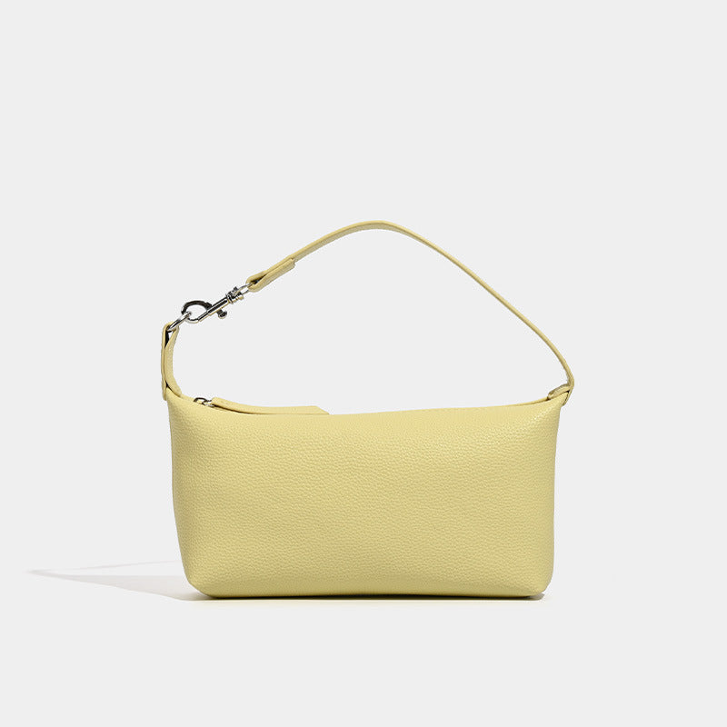 Small pebbled zip-top hobo bag with detachable adjustable strap and silver-tone hardware, front view
