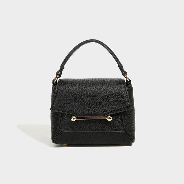 Small structured pebbled flap mini satchel with gold-tone bar hardware, short top handle, and detachable crossbody strap