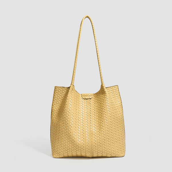 Large black basket-weave leather-look tote bag with long braided shoulder straps and matching woven zip pouch, detail view 8