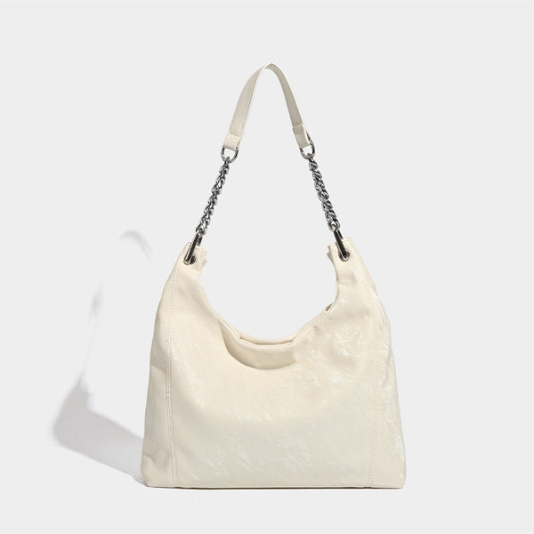 Large embossed leather-look shoulder tote bag with silver-tone chain strap, detail view 7