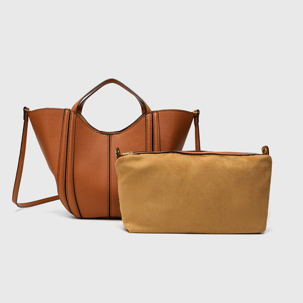 Structured open-top tote bag in tan brown pebbled leather-look finish with vertical seam accents, black edge piping, curved