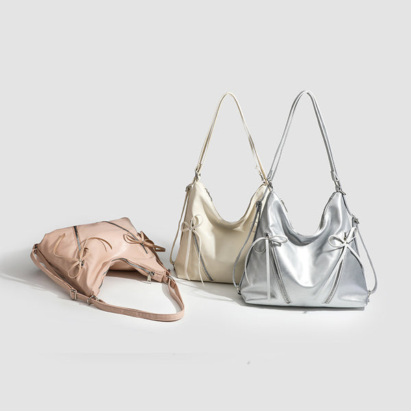 Slouchy hobo shoulder bag with bow detail and silver-tone hardware, detail view 2