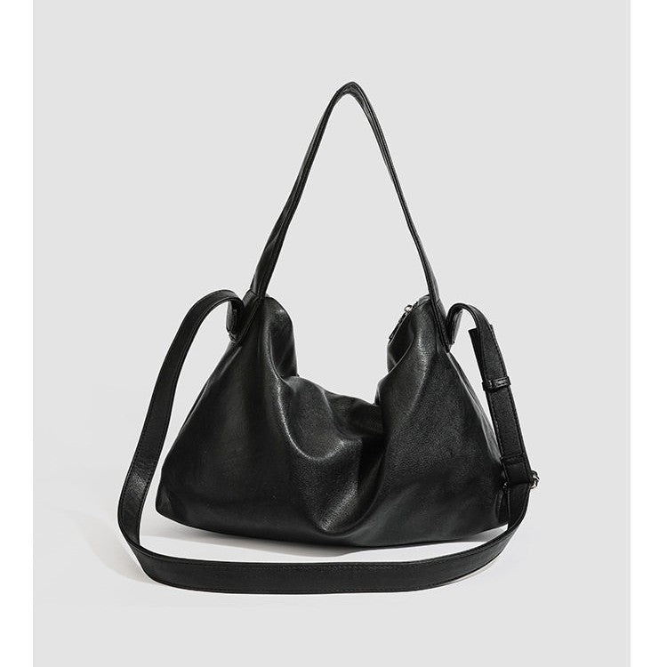 Slouchy leather-look hobo shoulder bag with top zipper and silver-tone hardware, detail view 4