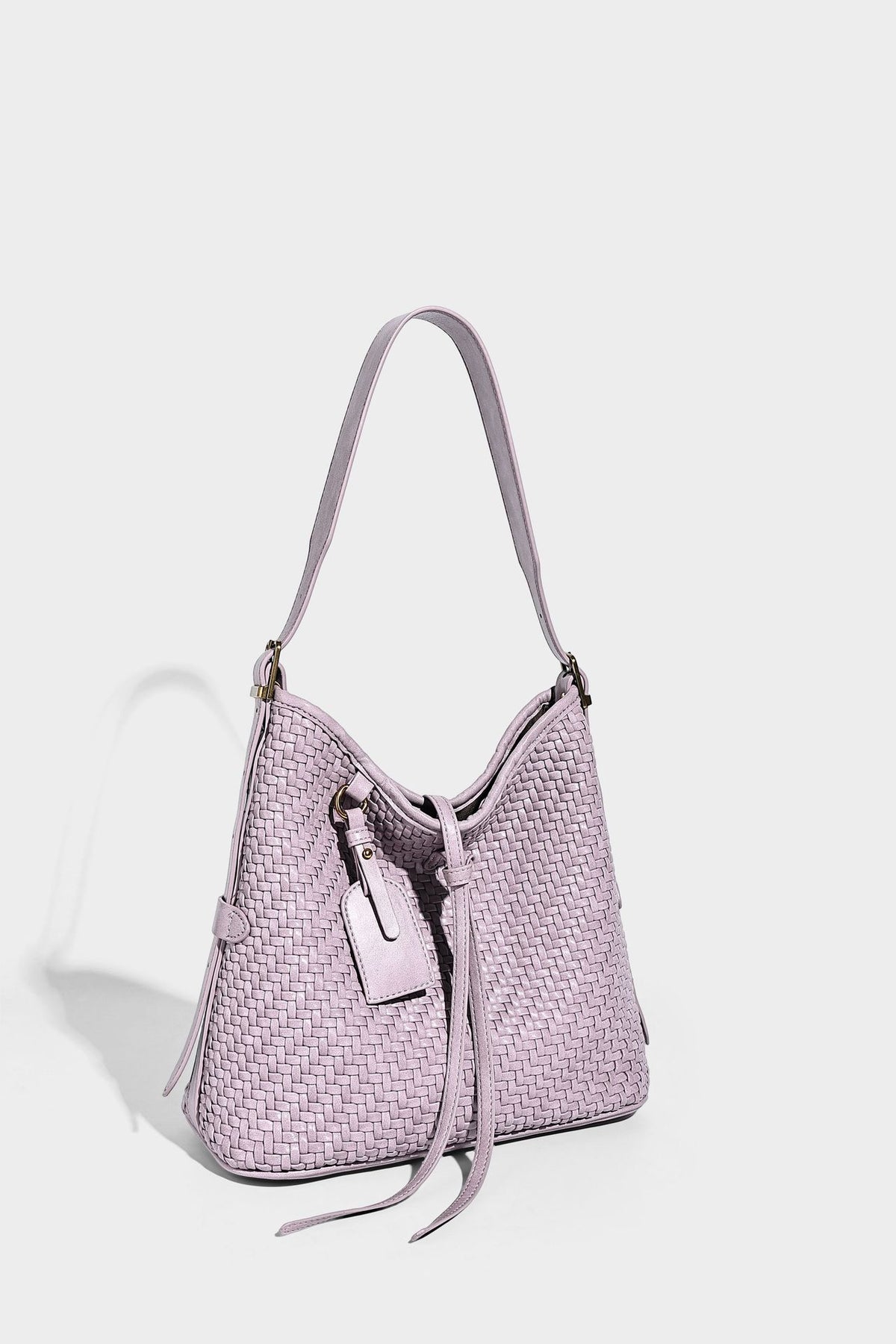 Slouchy woven-texture bucket shoulder bag with tassel tie closure and gold-tone hardware, detail view 23