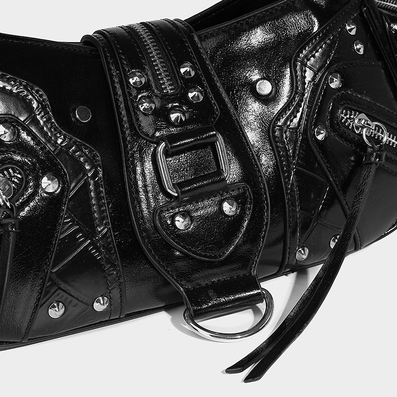 Compact glossy leather-look crossbody bag with silver studs, buckle hardware, and multiple zip pockets, detail view 20