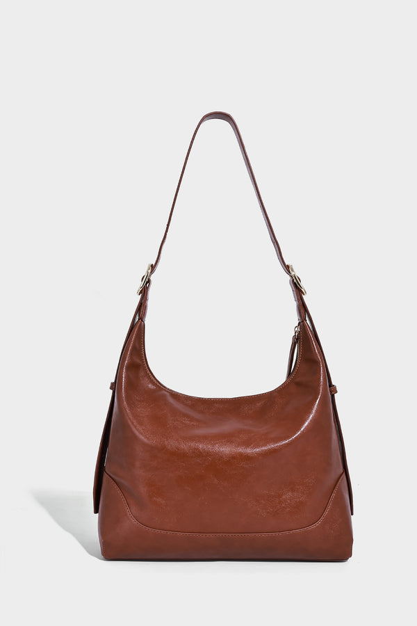 Glossy leather-look slouchy hobo shoulder bag with zip closure, gold-tone hardware, and adjustable strap, detail view 17