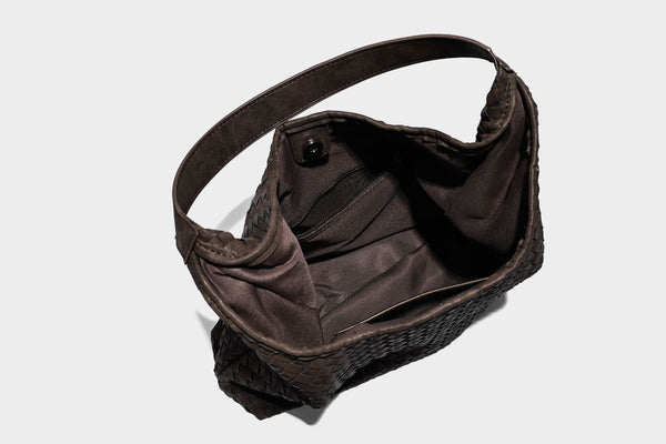 Slouchy woven hobo shoulder bag with knotted strap and matte leather-look textured finish, detail view 29