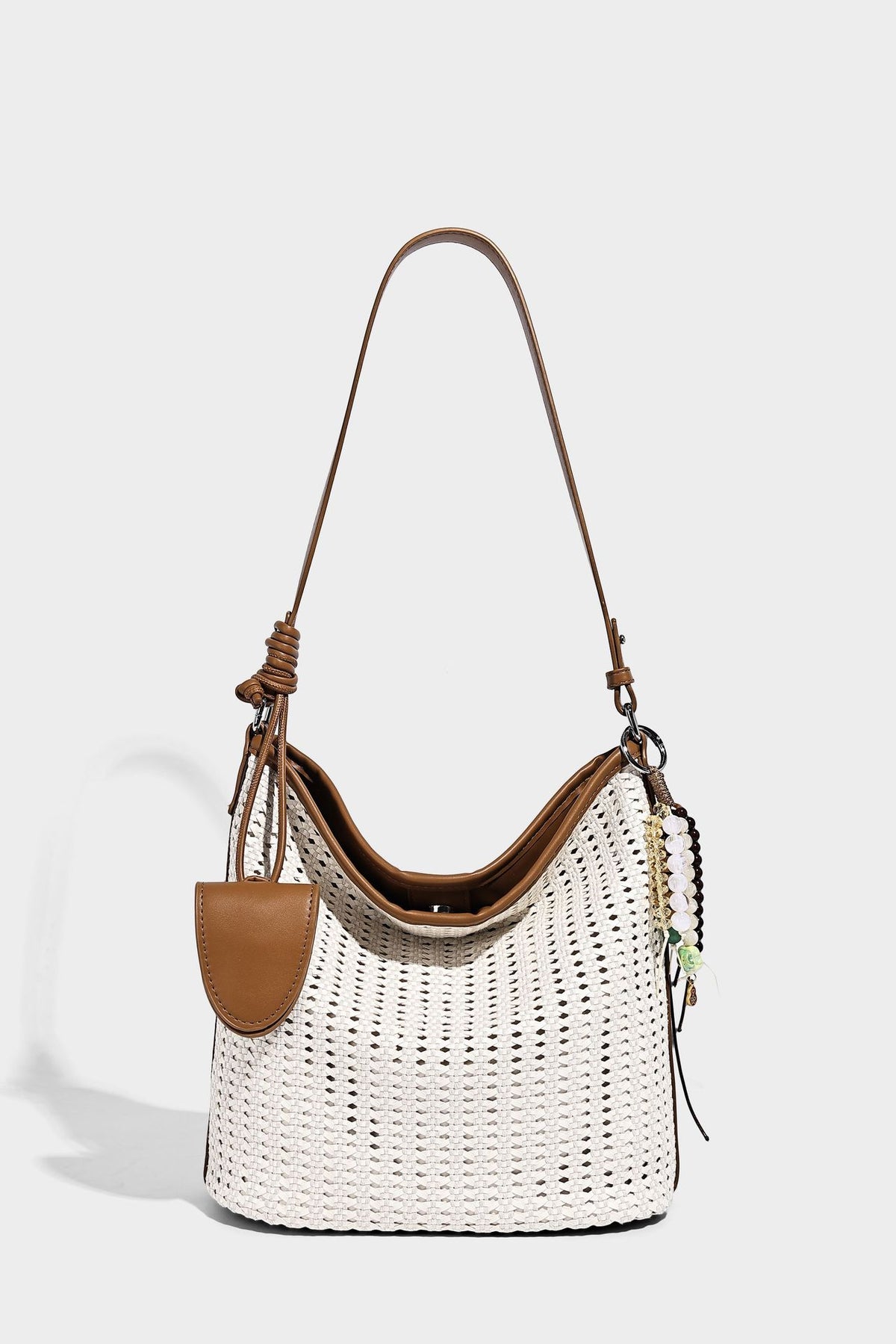 Slouchy open-weave hobo shoulder bag with leather-look trim, beaded tassel charm, and adjustable strap, detail view 15