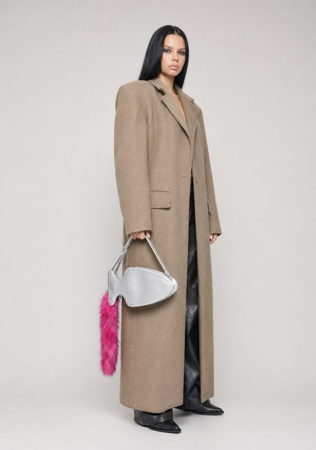 Fish-shaped pebbled leather-look crossbody bag with black faux-fur tail accent and adjustable shoulder strap, detail view 11