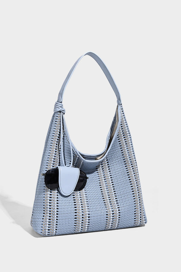 Woven striped slouch shoulder tote bag with knotted strap and attached front flap pouch, detail view 18