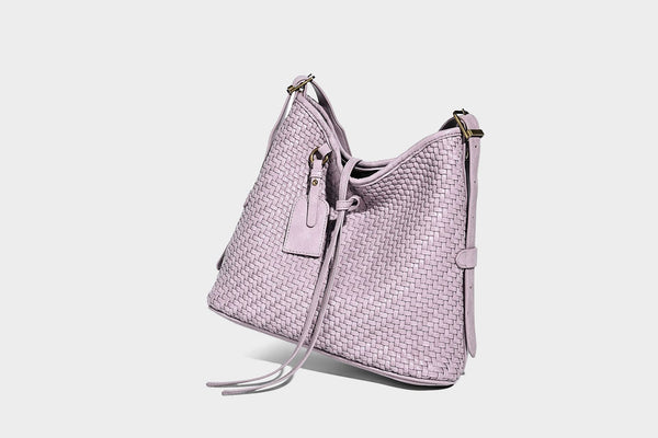 Slouchy woven-texture bucket shoulder bag with tassel tie closure and gold-tone hardware, detail view 24