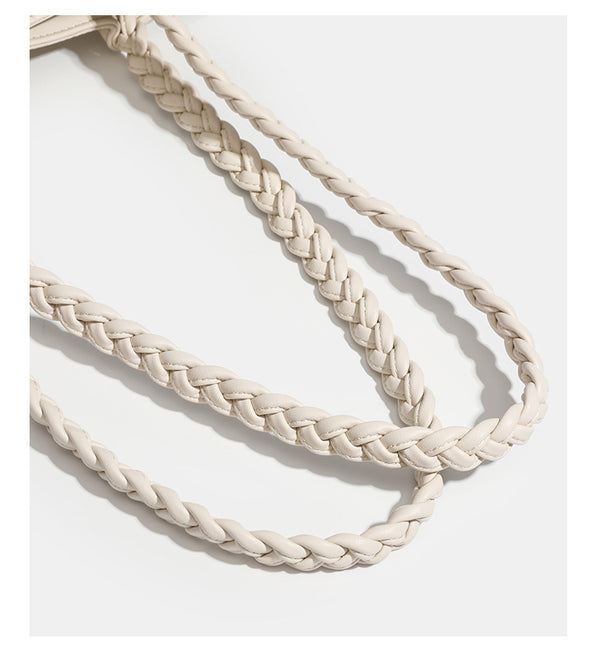 Structured geometric-embossed tote bag with braided shoulder straps and gold-tone hardware in ivory, detail view 16