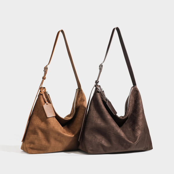 Slouchy croc-embossed matte hobo shoulder bag with adjustable strap and top zip closure, detail view 4