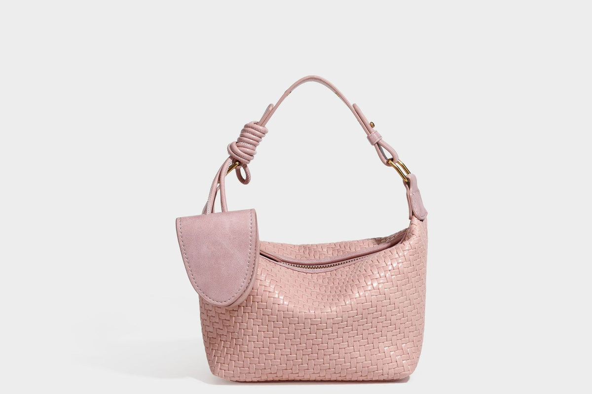 Small glossy basket-weave hobo shoulder bag in brown with knotted top handle, flap accent pocket, and gold-tone hardware