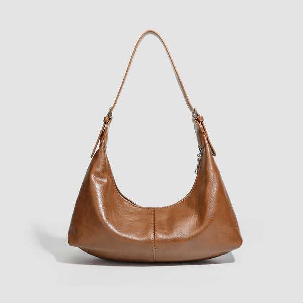 Slouchy crescent hobo shoulder bag with zip-top closure and adjustable strap, detail view 4