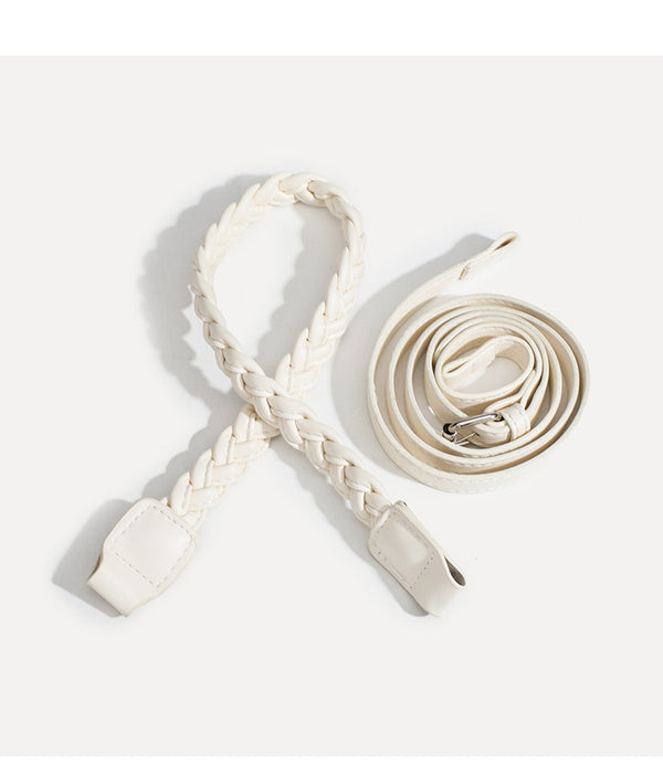 Slouchy hobo shoulder bag with gathered leather-look panels, silver-tone chain with charm pendants, and braided strap, detail