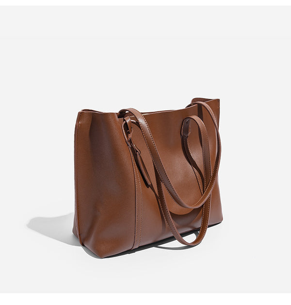 Large structured leather-look tote bag with belt-strap detail and gold-tone hardware, detail view 13