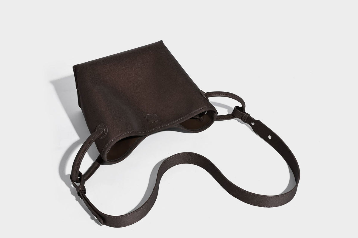 Small structured matte pebbled tote bag with twin top handles and removable zip pouch, detail view 27