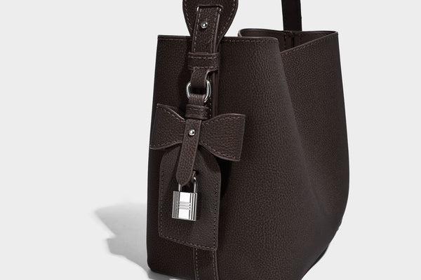 Pebbled leather-look bucket shoulder bag with zip inner pouch and adjustable crossbody strap, detail view 14