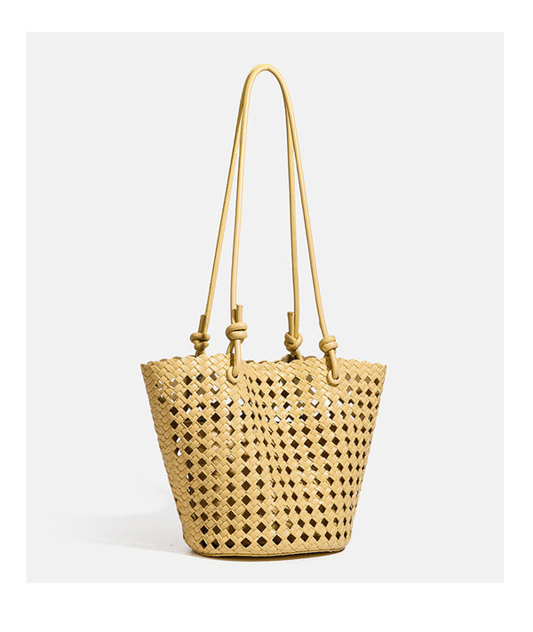 Open-weave lattice bucket tote bag with long knotted cord handles and tapered silhouette, detail view 22