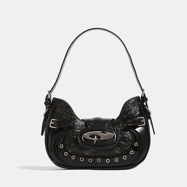 Compact croc-embossed leather-look shoulder bag with silver grommet trim, buckle strap detail, and four-point star turn-lock