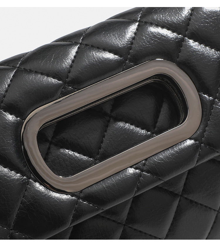 Quilted diamond-stitch flap crossbody bag with gunmetal chain strap and cut-out bar handle, detail view 17