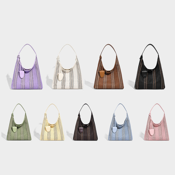 Woven striped slouch shoulder tote bag with knotted strap and attached front flap pouch, detail view 2