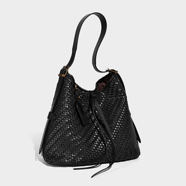 Slouchy woven-texture bucket shoulder bag with tassel tie closure and gold-tone hardware, detail view 7