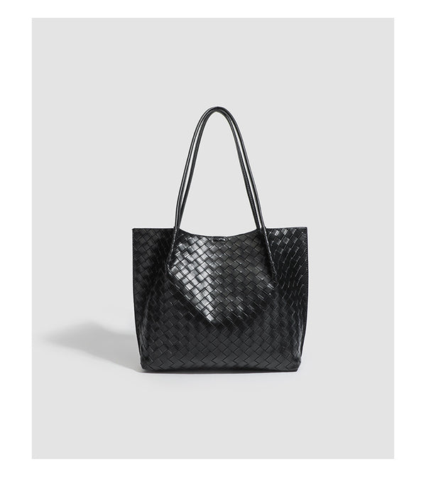 Large black woven leather-look tote bag with twin shoulder straps and matching inner pouch, detail view 8