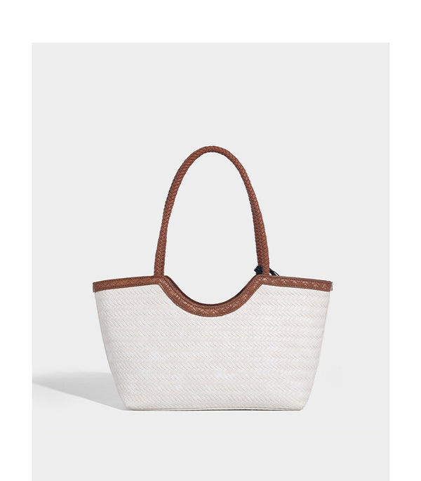 Large open-top woven tote bag with contrasting braided double handles and matching drawstring pouch, detail view 18