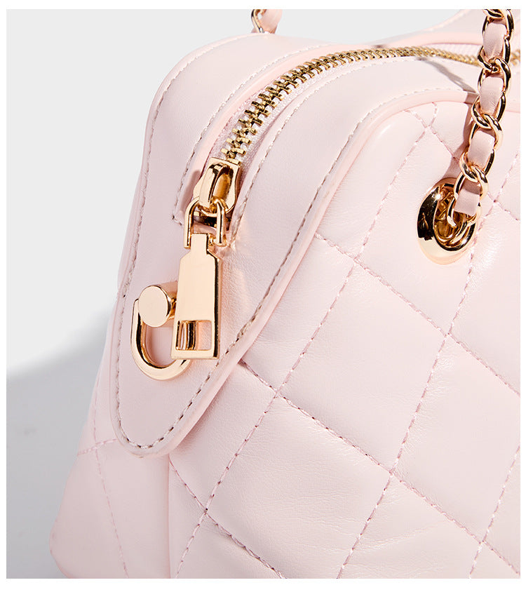 Diamond-quilted mini shoulder bag with gold-tone chain strap and top zip closure, detail view 13
