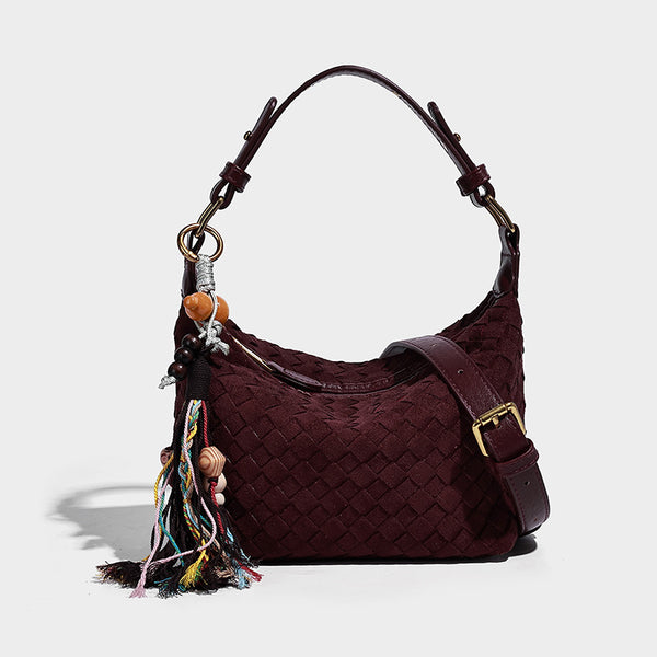 Small woven-texture crescent hobo bag in dark chocolate brown with top zip closure, gold-tone hardware, and adjustable