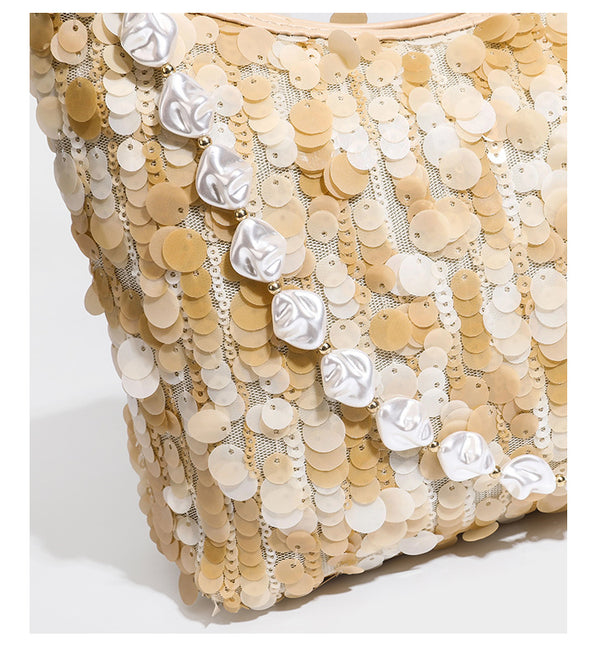 Champagne and ivory large-disc sequin shoulder bag with baroque faux-pearl beaded chain strap and silver-tone zip closure